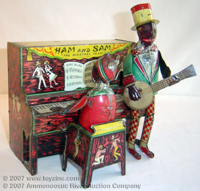Black Americana tin toy band an banjo player