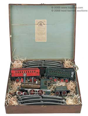 live steam-powered train set in its original wooden packing carte was made by Ernst Plank