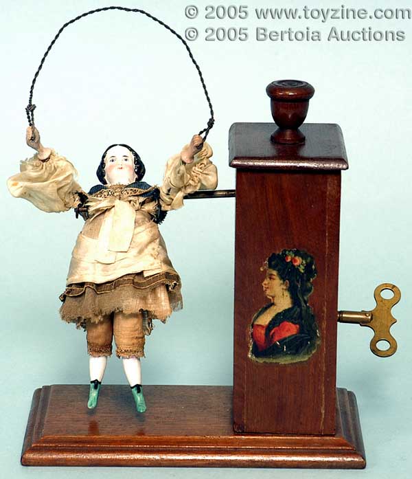 The Early American toy session contains a few classic nineteenth century examples by famous makers. Picture here is a beautiful Girl Skipping Toy by Automatic Toy Works, circa 1875