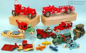 cast iron cars and tin toys