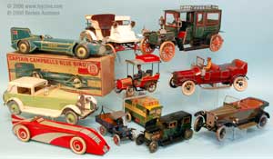cast iron cars and tin toys