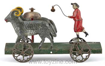 Woman and Two Rams Tin Bell Toy