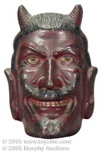 4½in tall cast-iron Two-faced Devil still bank