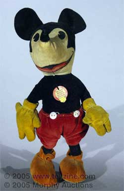1930s velvet Mickey Mouse doll still has its Steiff paper label and exhibits a Mickey Mouse Walt Disney stamp