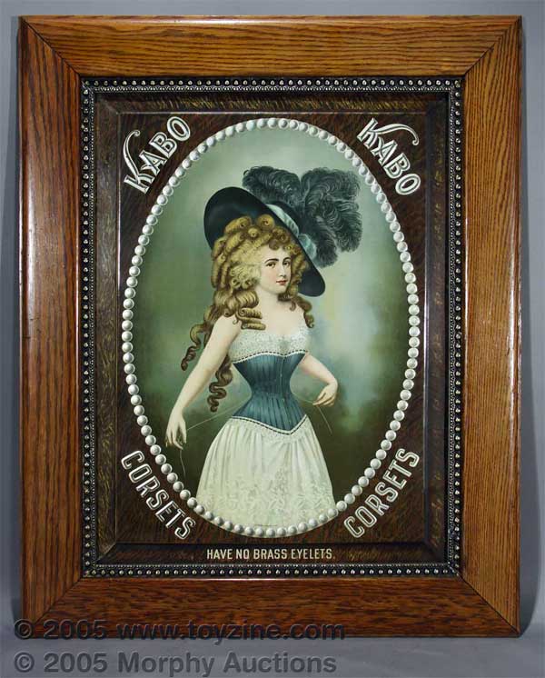 full-color embossed tin litho sign features a late 19th century beauty turn of the 20th century beauty in a Kabo Corset